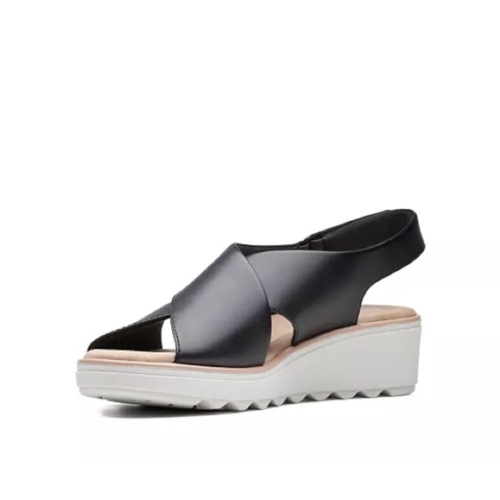 Clark women’s Sandals, I used it twice, like new and very soft .